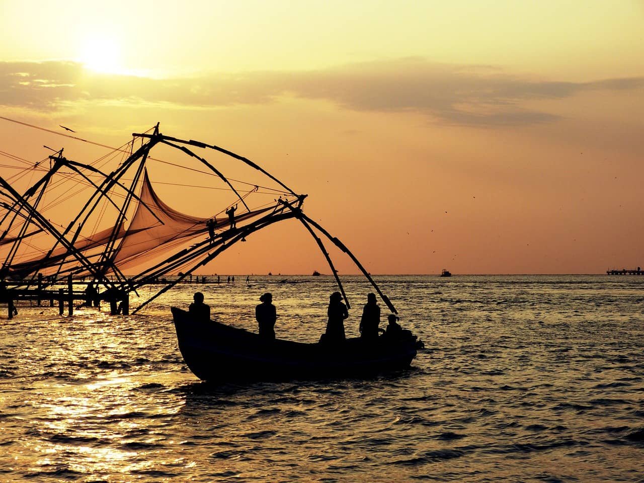 Sunset over Chinese fishing nets in Kochi Cochin, Kerala